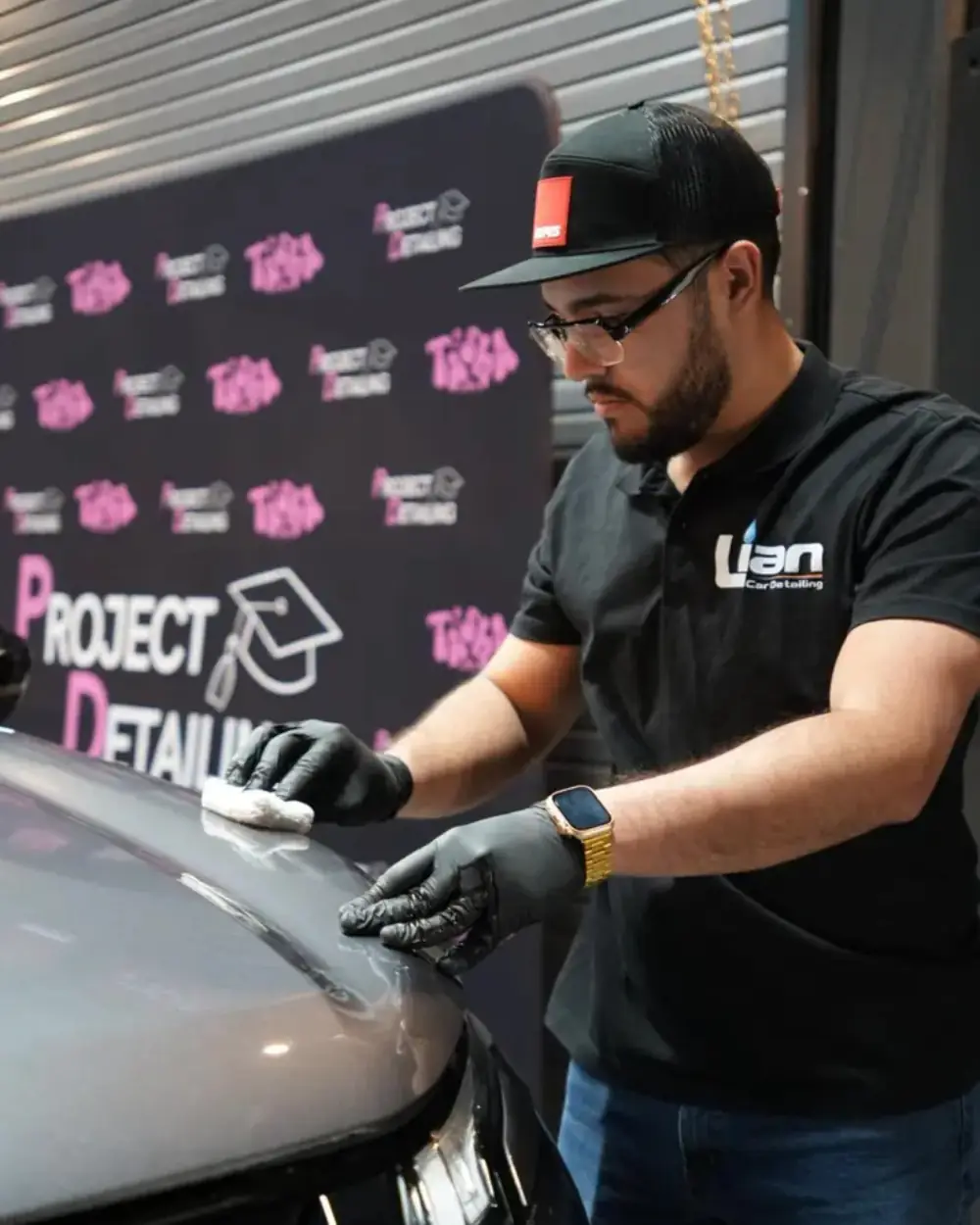 Glossy ceramic-coated black car in Miami, FL